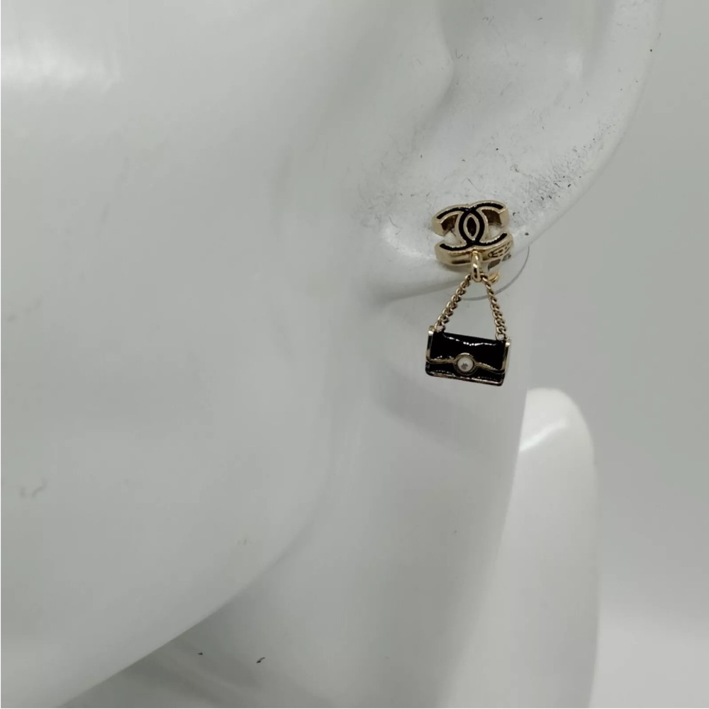 Chanel pierced earrings.
